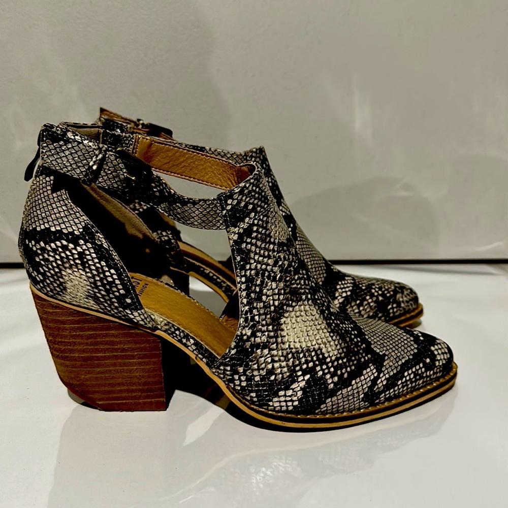 Size 7 heeled snake skin booties in excellent condition worn once